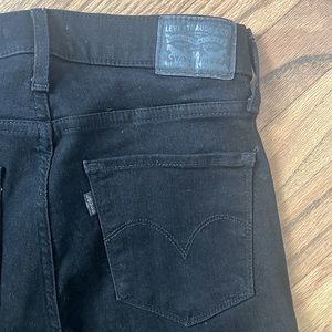 Levi black skinny jeans